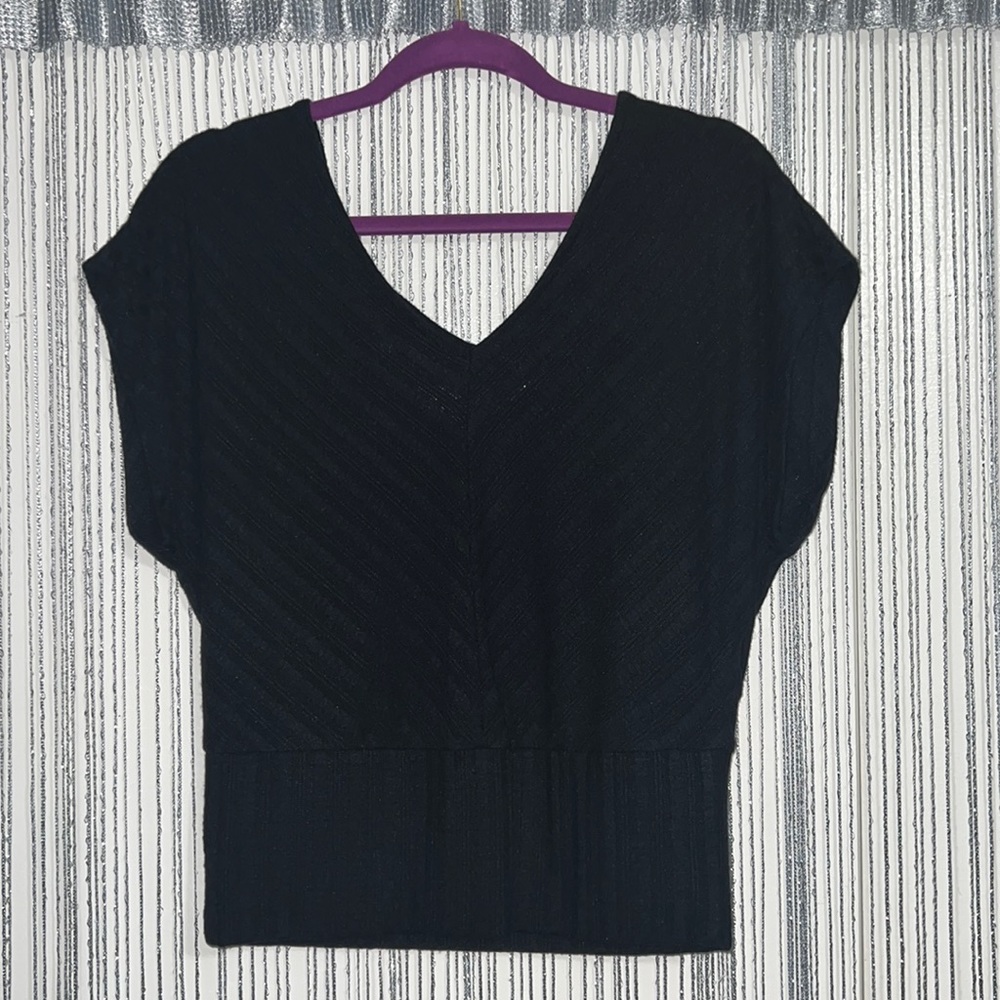 Black sweater with cris cross detail in back size Large